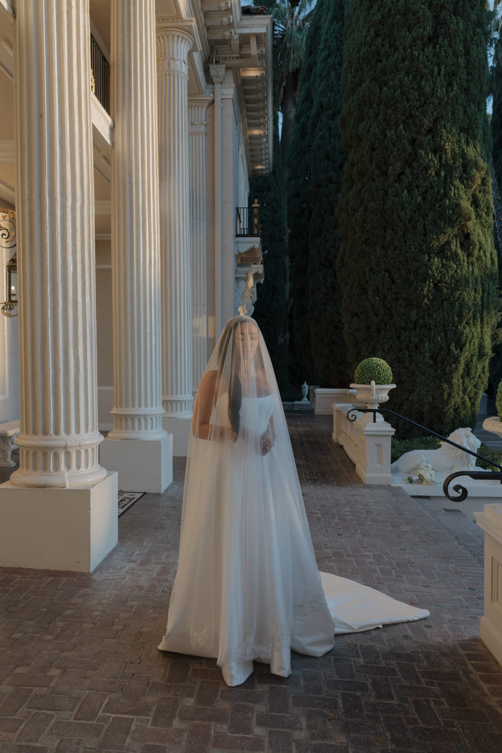 A bridal portrait in front of Norcal wedding venue Grand Island mansion