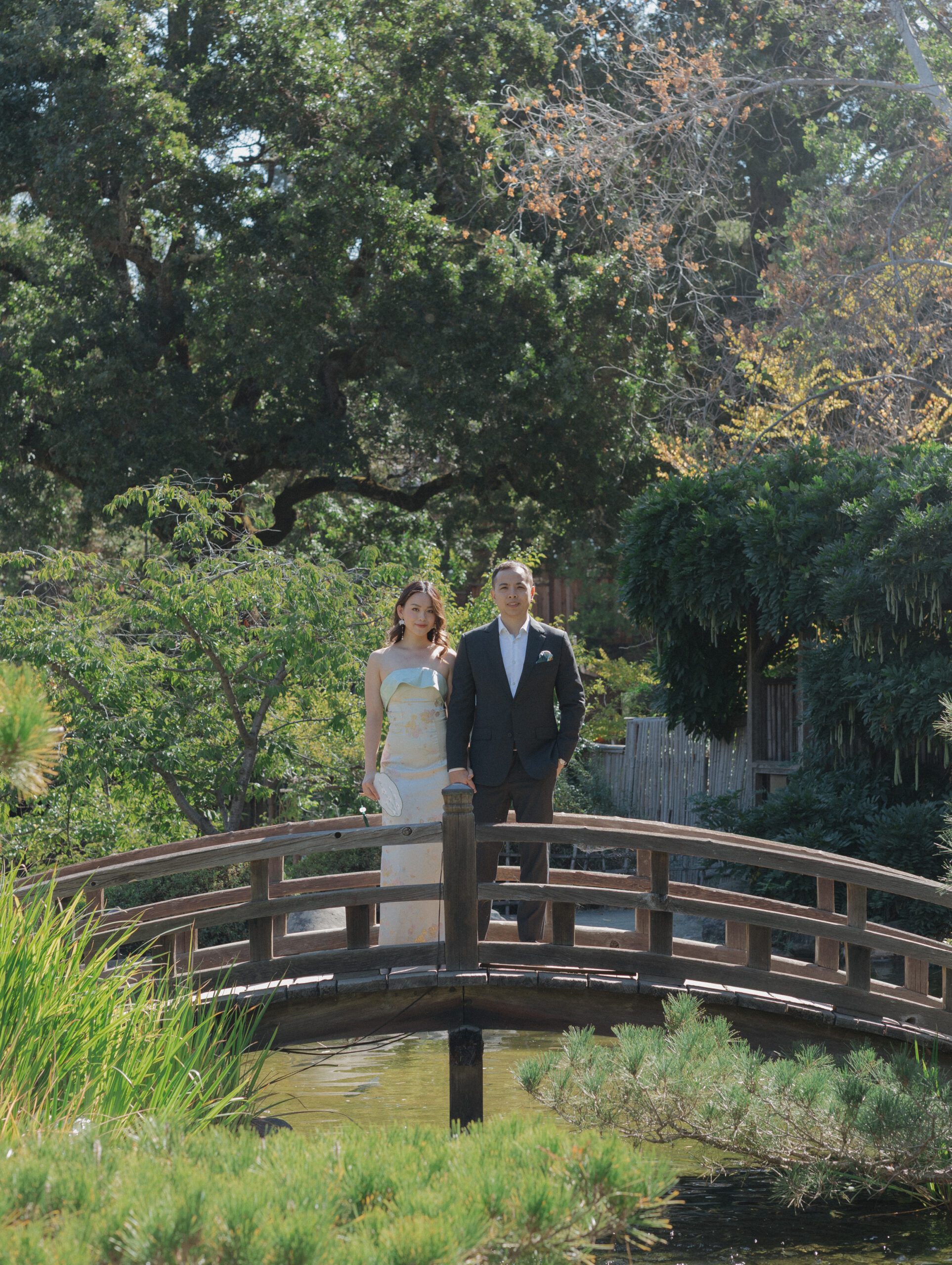 A bride and groom on a bridge at normal wedding venue Hakone estates and gardens