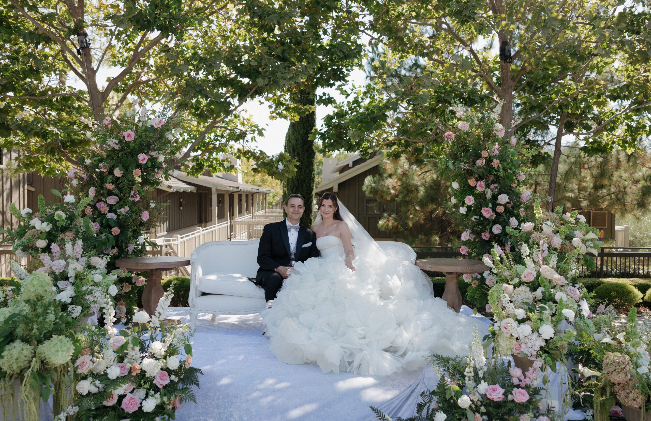 A bride and groom posing for wedding photos at their NorCal wedding venue