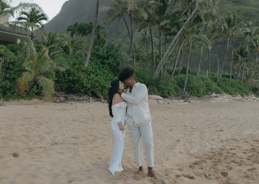 A bride and groom kissing during their Hawaii elopement