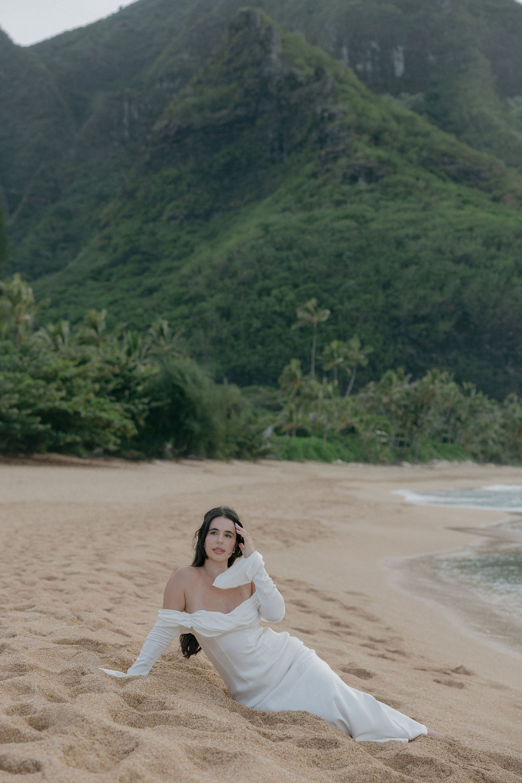 Bridal portraits on the beach from a Hawaii elopement, in a Hawaii elopement dress
