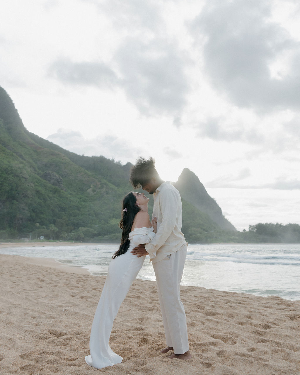A couple leaning in for a kiss during Hawaii elopement photos