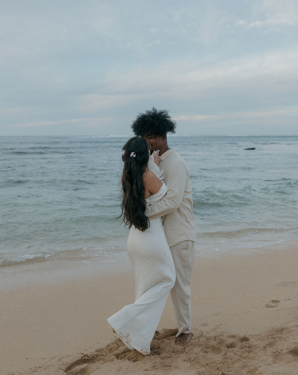 A bride and groom kissing during their Kauai elopement