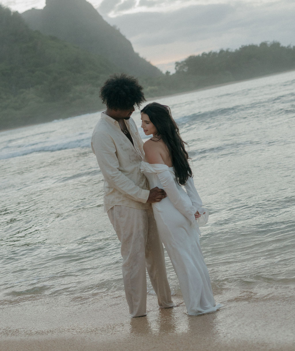 A wedding couple posing for Hawaii elopement photos