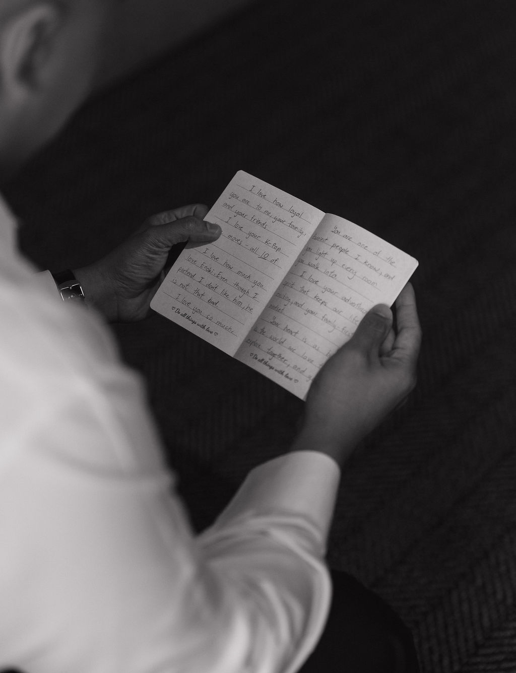 A groom reading his private vows