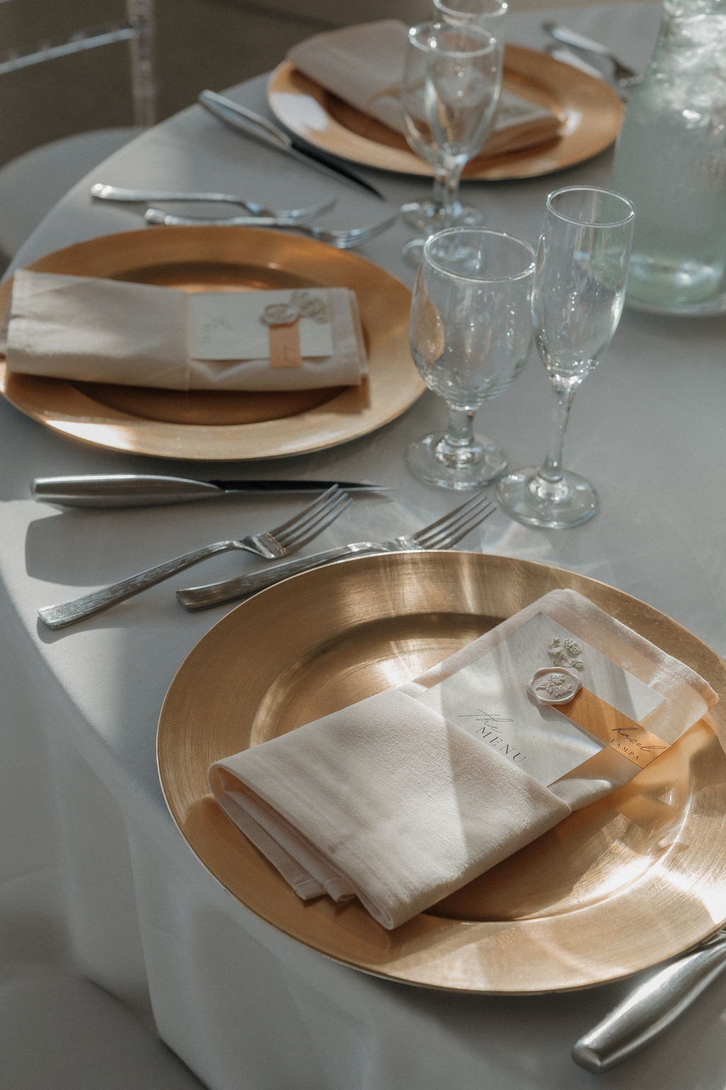 Wedding table setups from a rental company chosen from a wedding vendor checklist