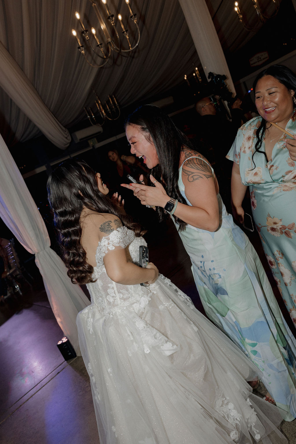 Candid wedding reception photos captured by a Sacramento wedding photographer from a wedding vendor checklist