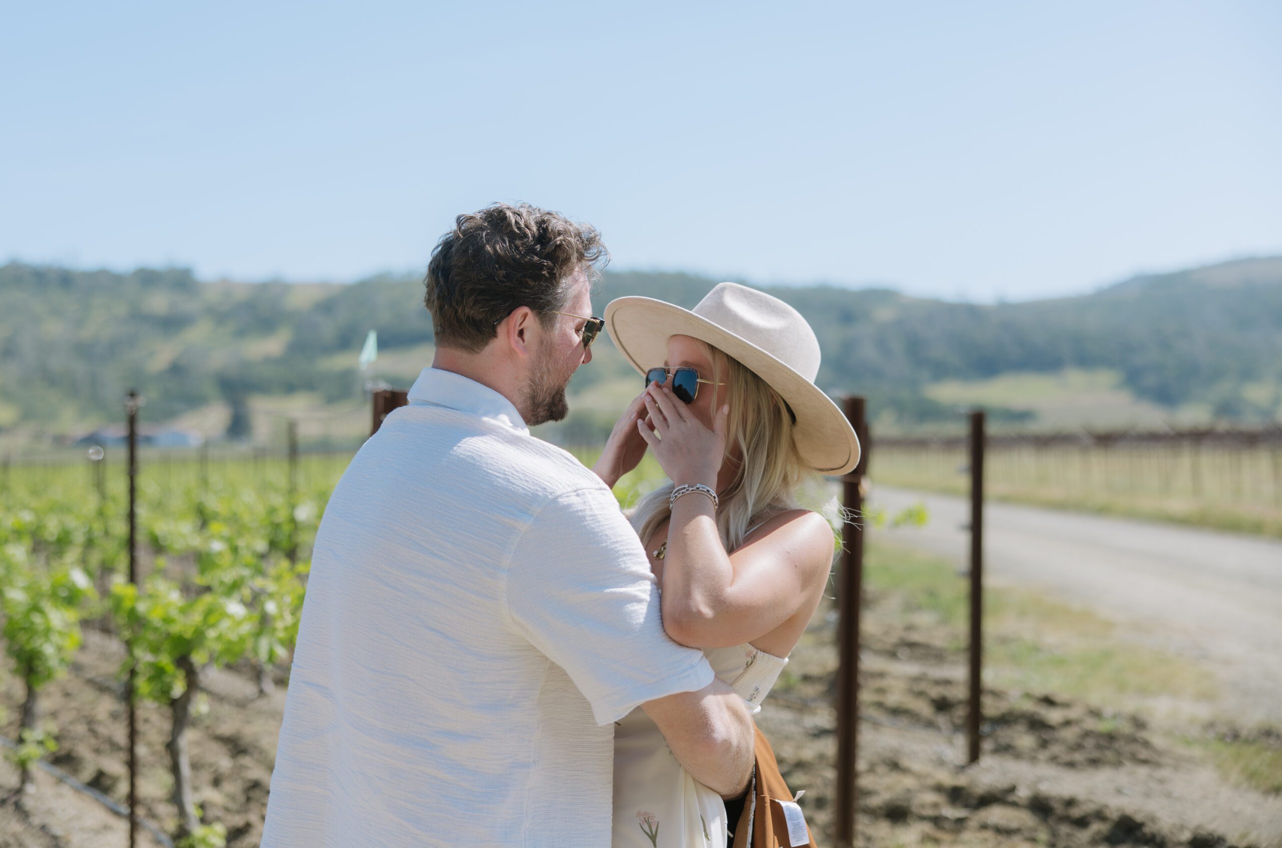 A woman crying after her surprise proposal