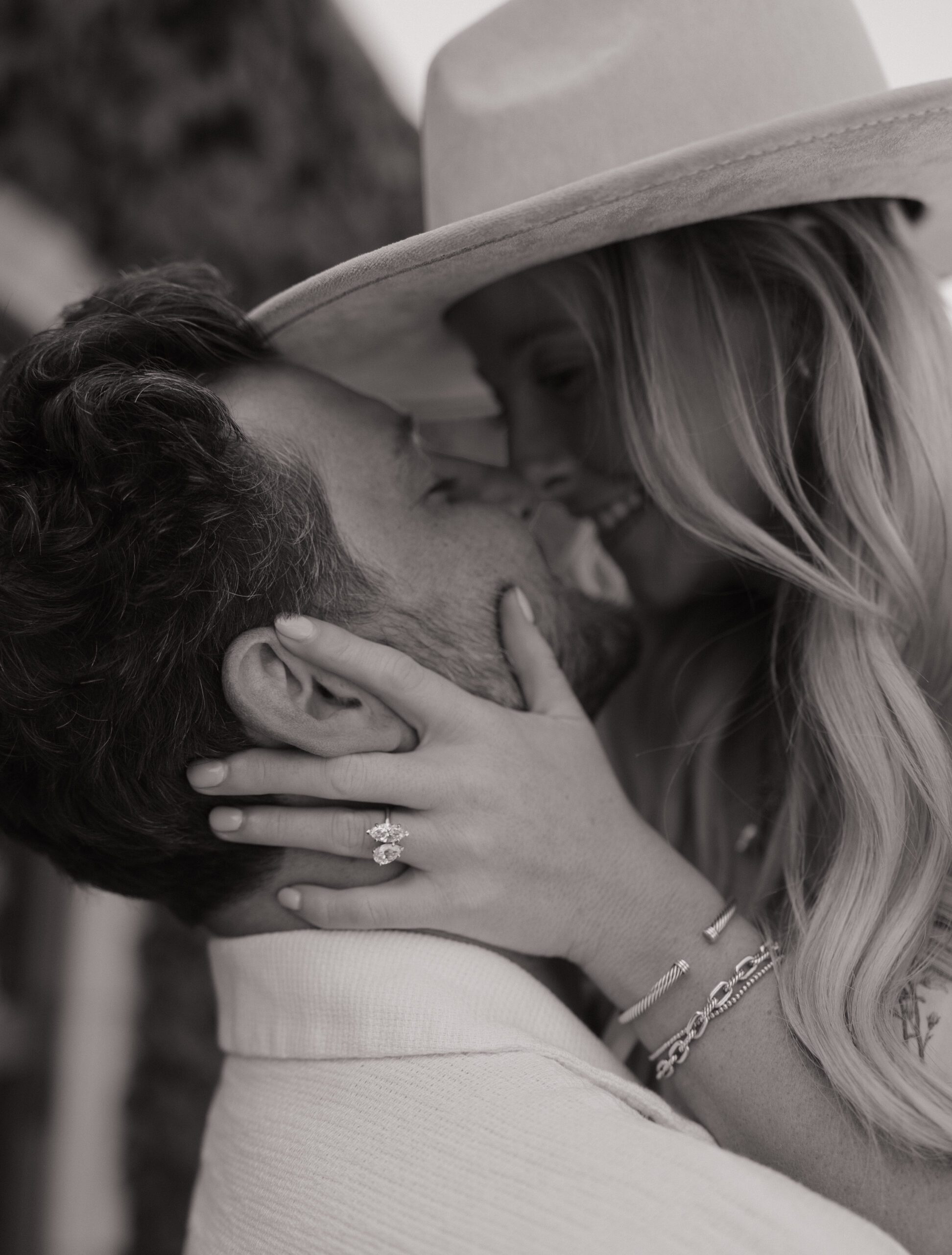 A couple kissing during engagement photos
