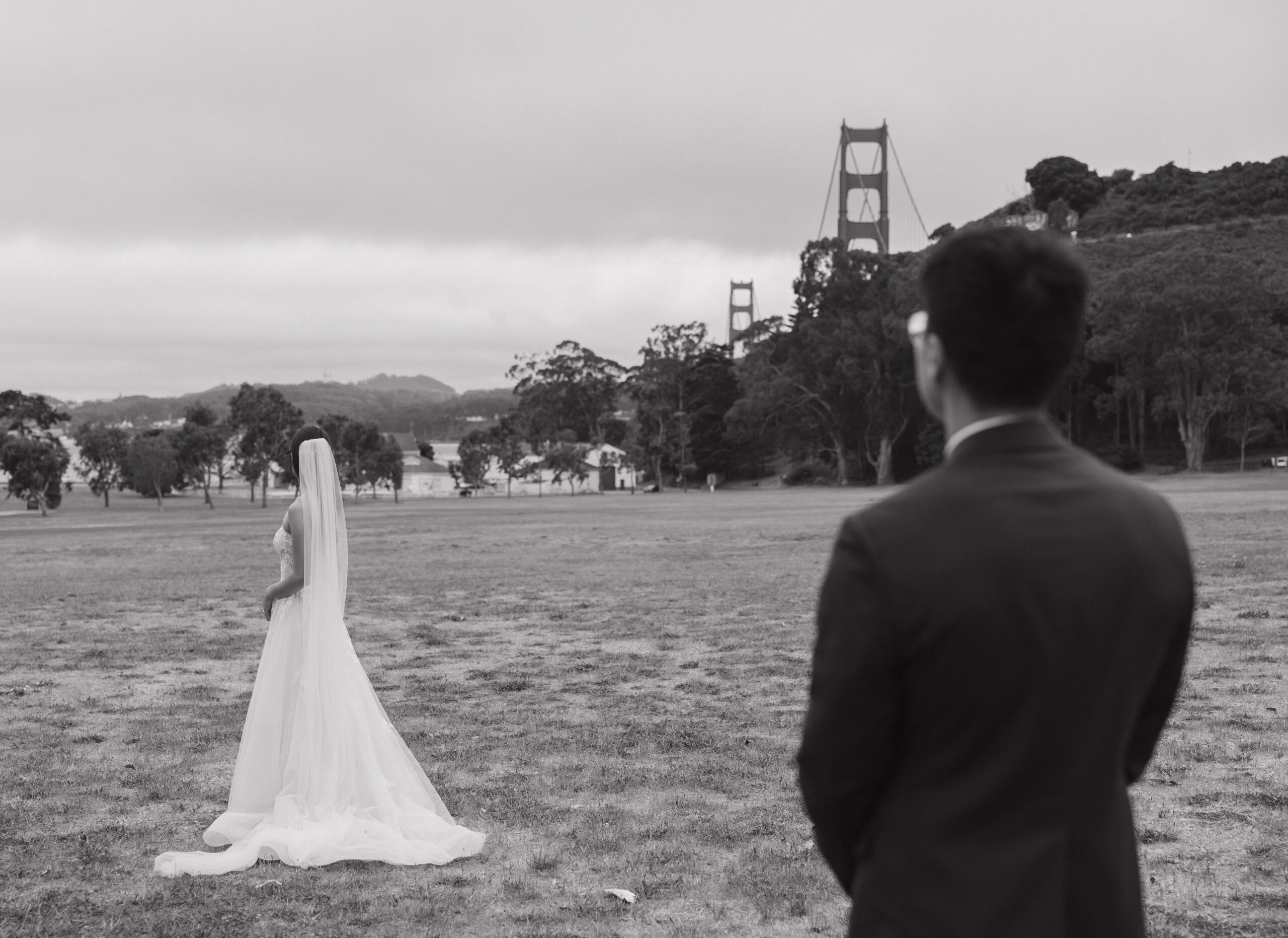 A bride and groom taking portraits at their Cavallo Point Lodge wedding