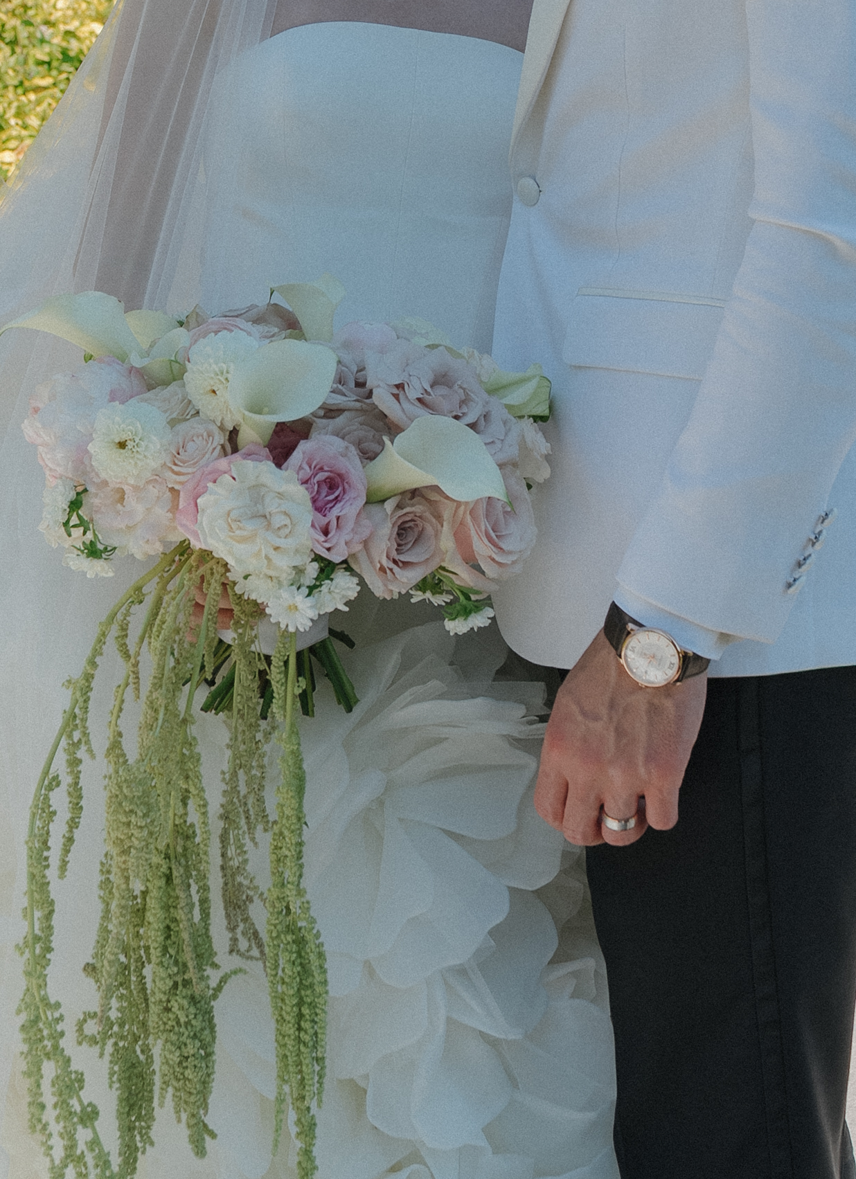 A bride holding a luxury wedding bouquet