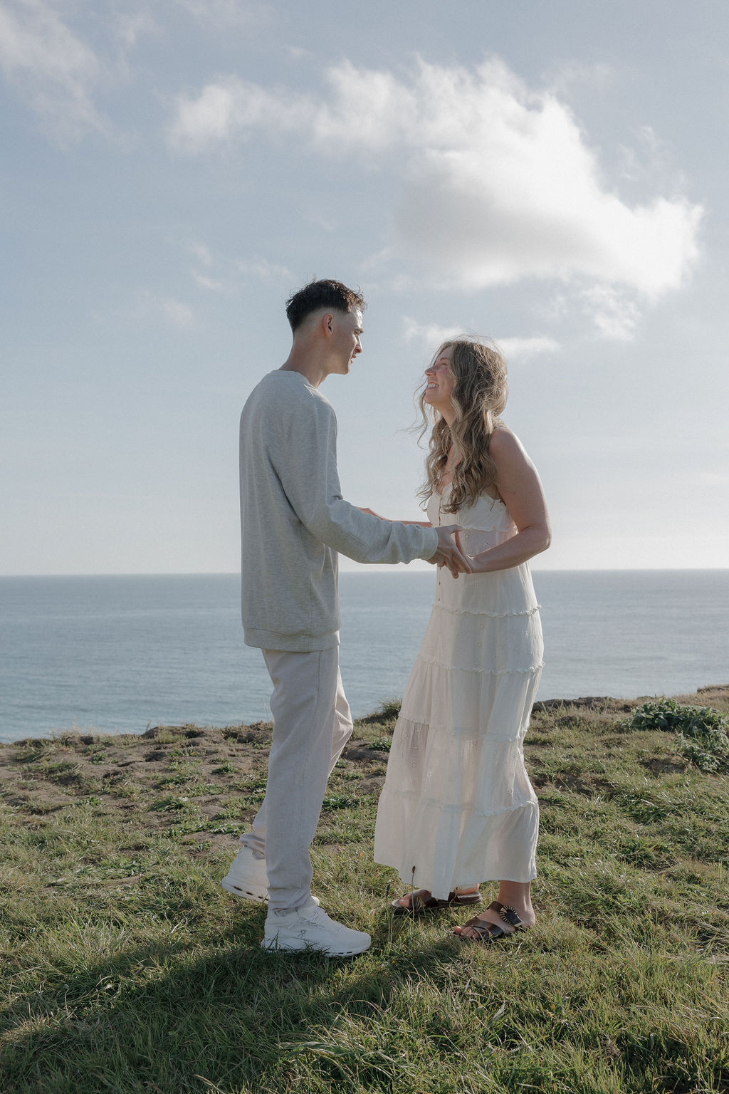 A couple in front of the ocean in Point Reyes