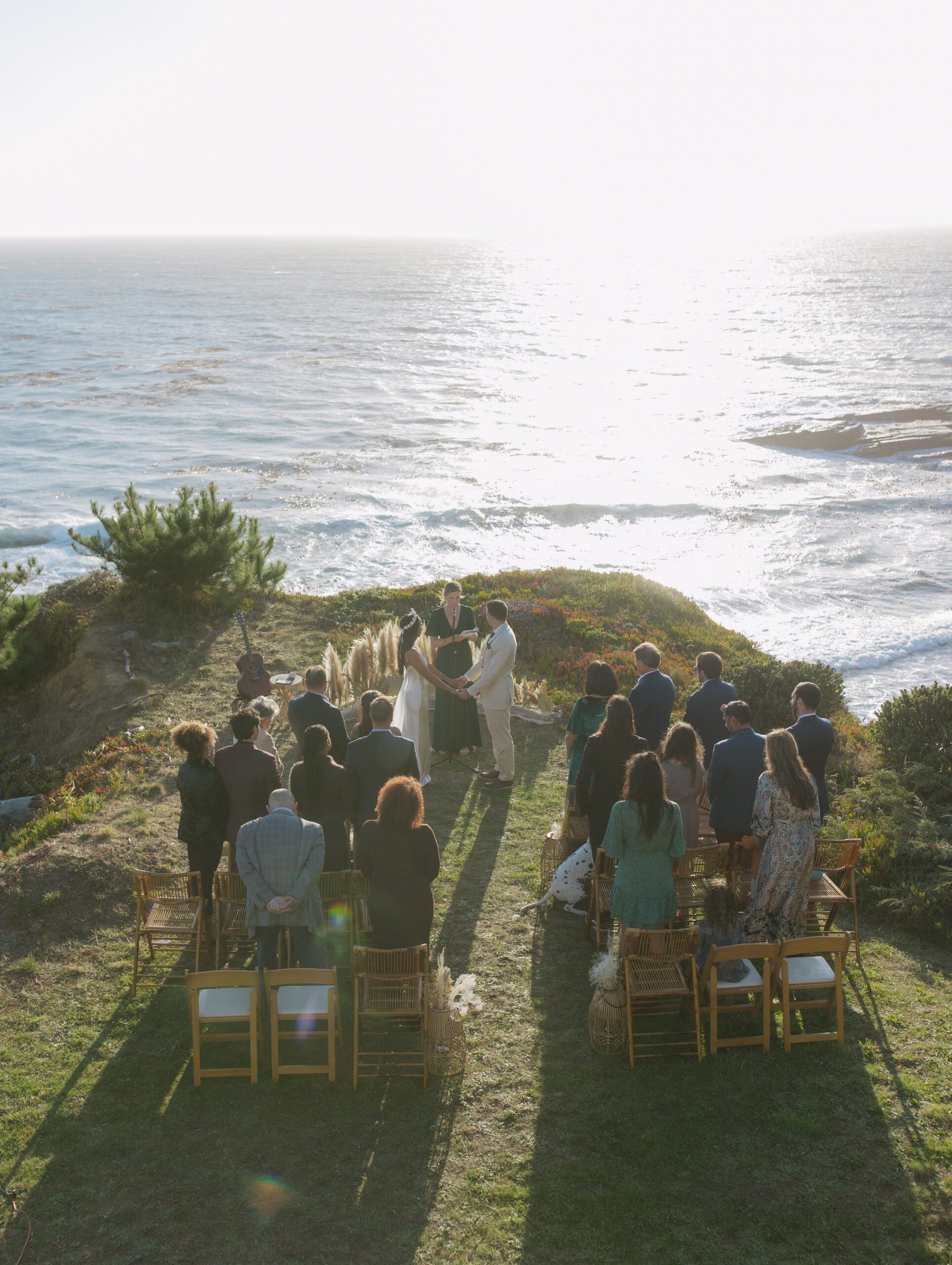 A waterfront wedding ceremony taking place at Bodega Bay