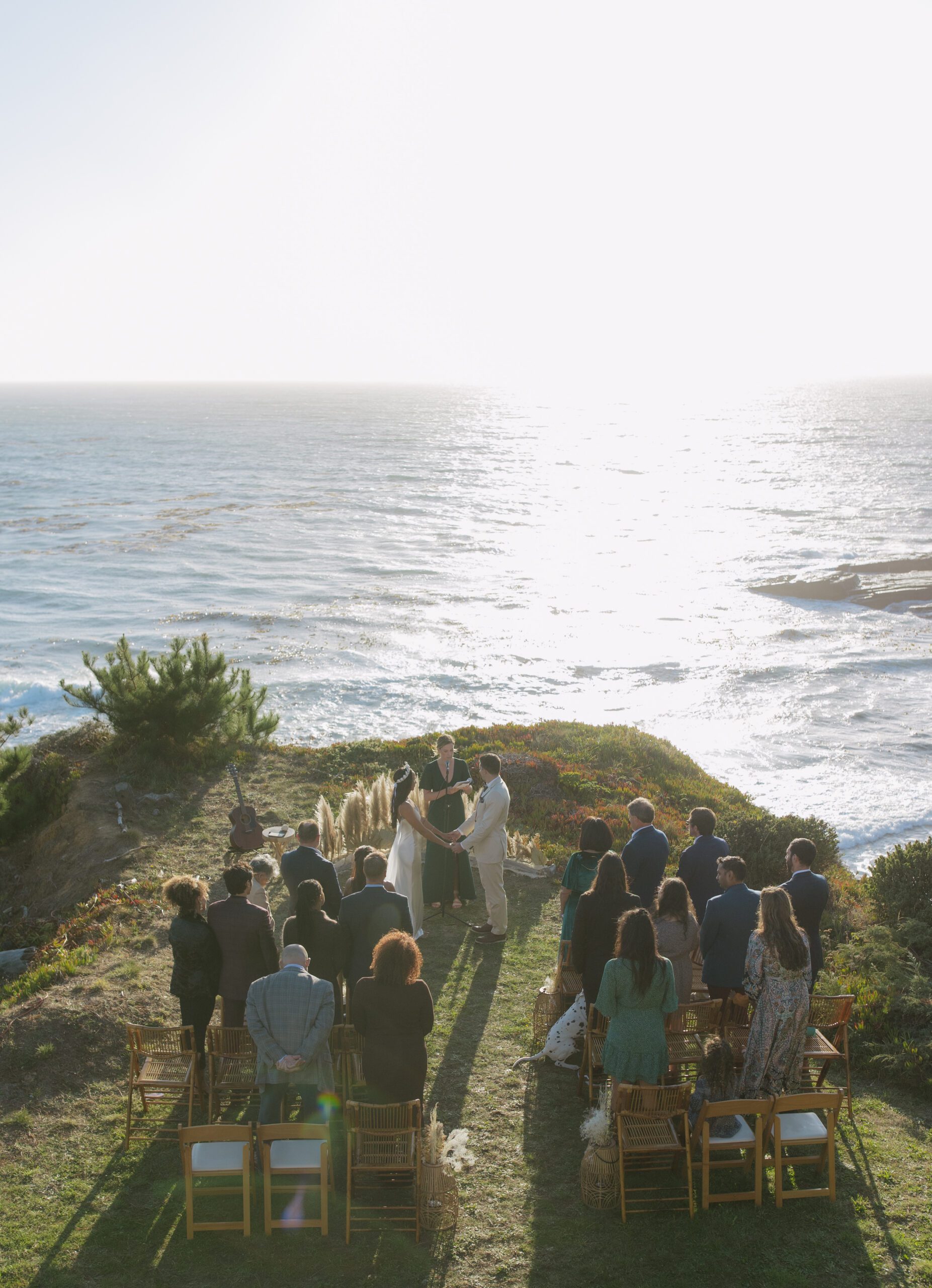 A waterfront wedding ceremony taking place at Bodega Bay