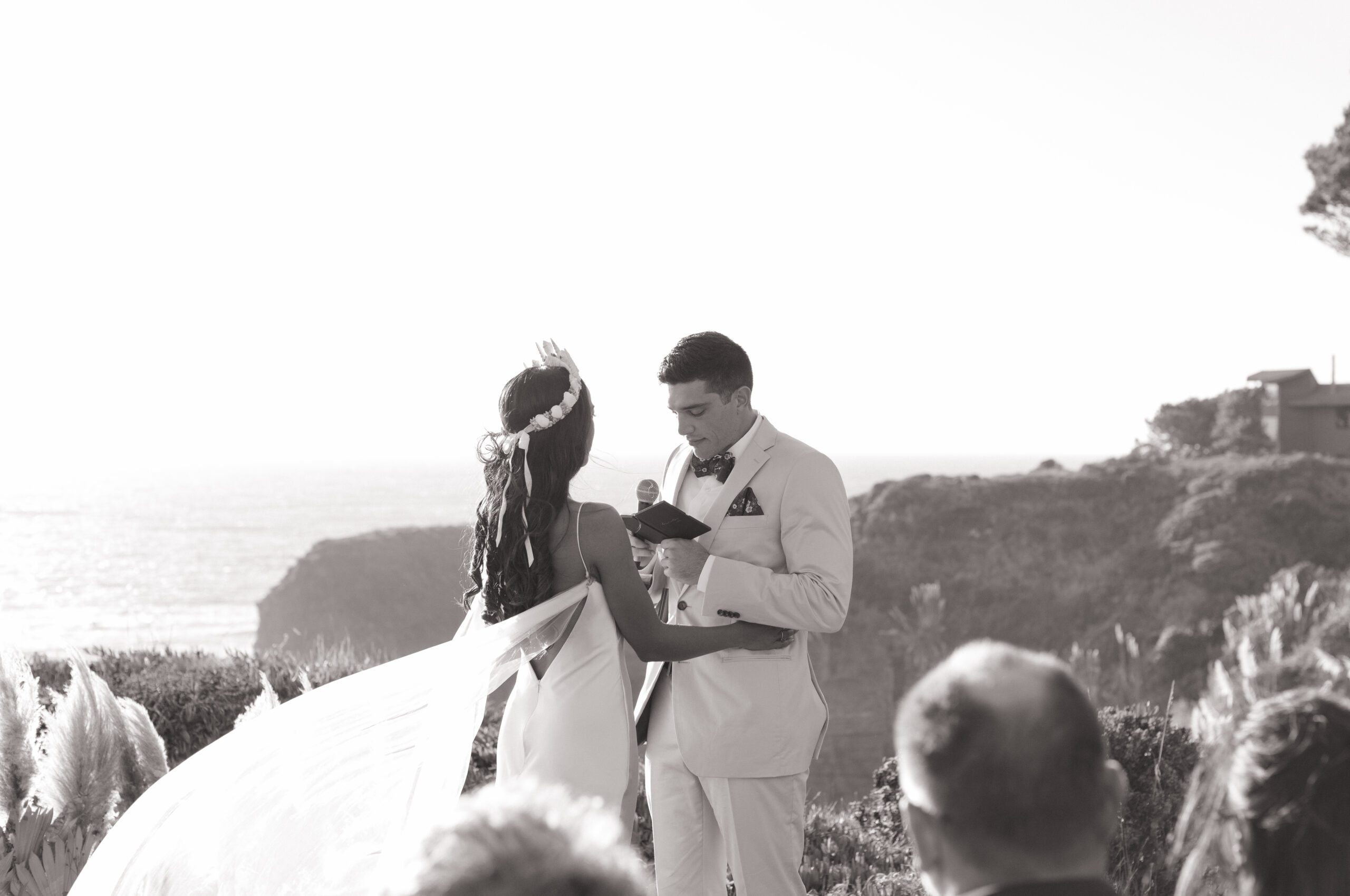 A bride and groom in a candid wedding ceremony photo