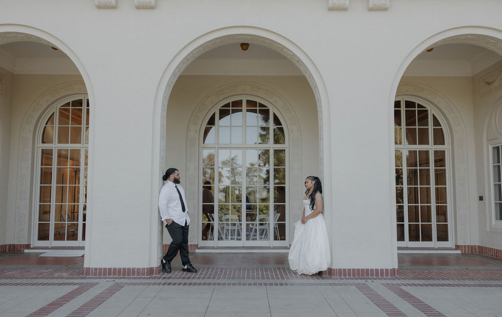 A couple posing for wedding photos at Montalvo Arts Center