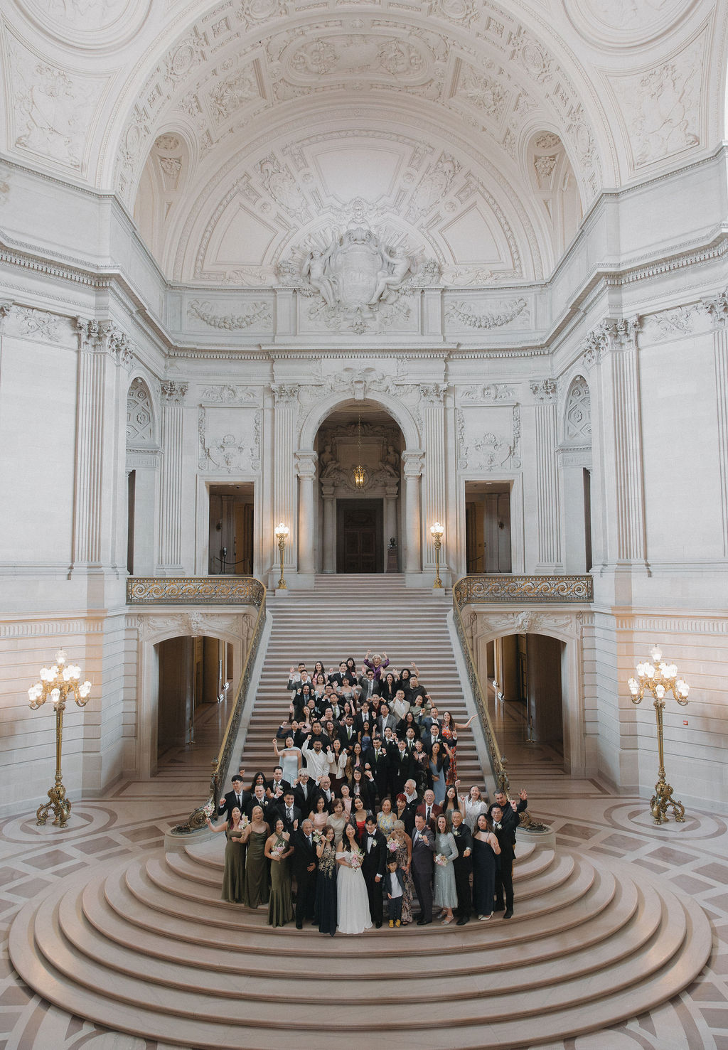 A family celebrating after a San Francisco City hall wedding