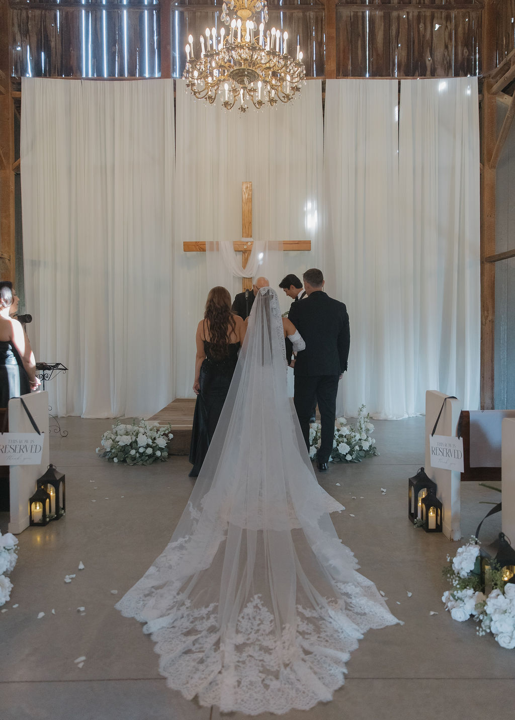 A bride and groom during a wedding ceremony at Lamoure Vineyards