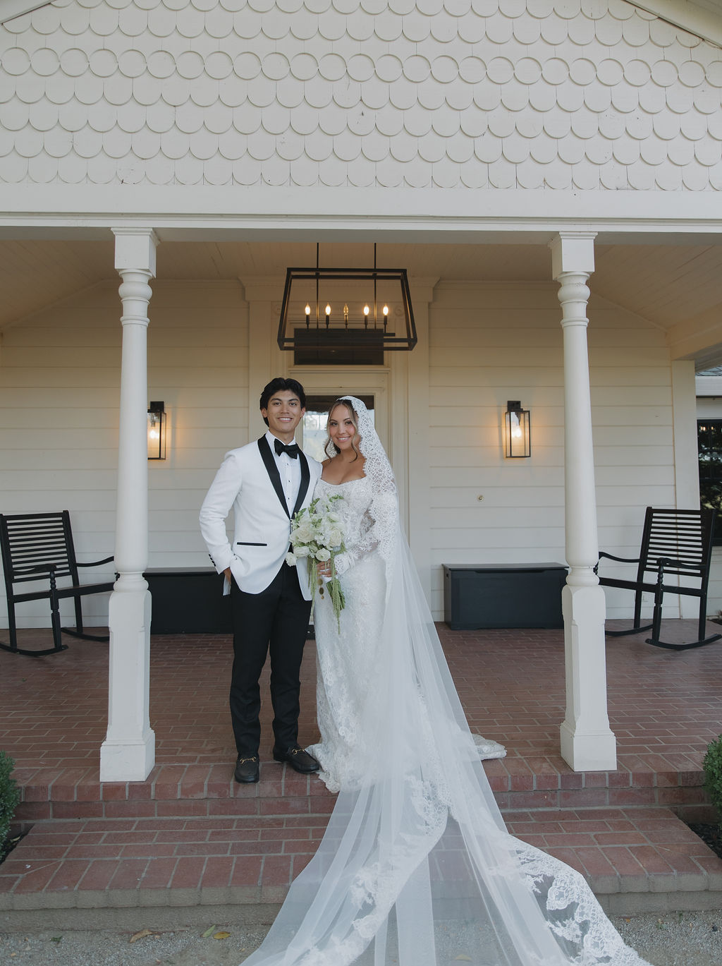 A bride and groom taking wedding photos