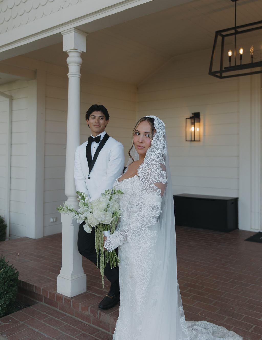 A bride and groom taking wedding photos