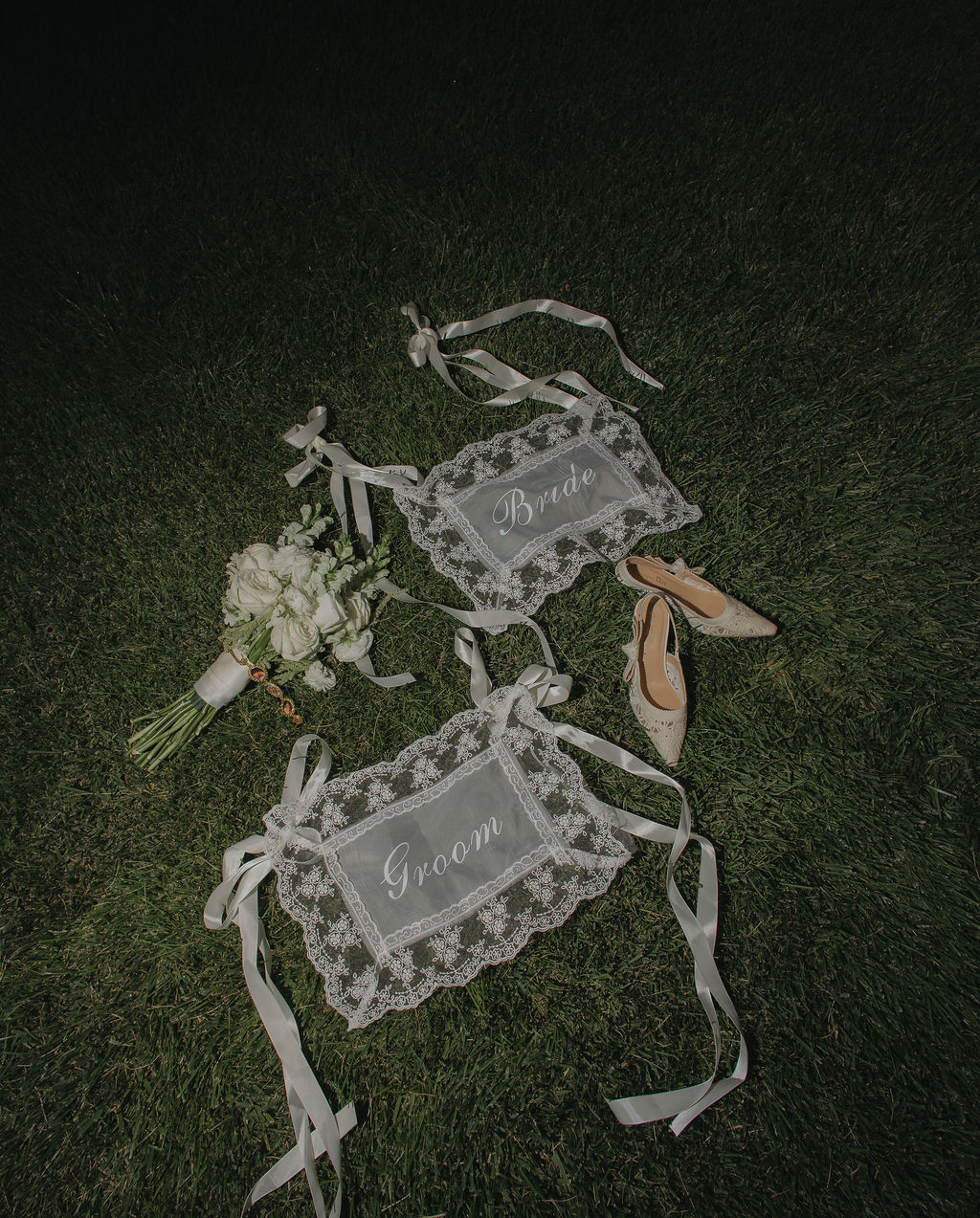 A wedding flat lay on the grass