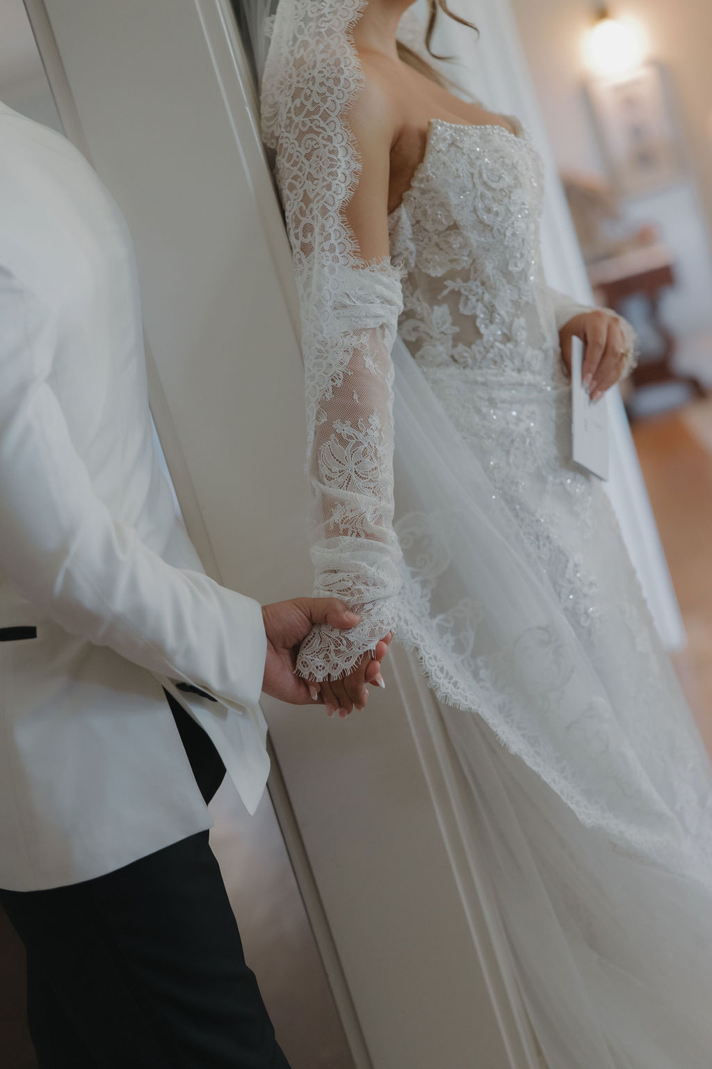 A bride and groom during a private first touch