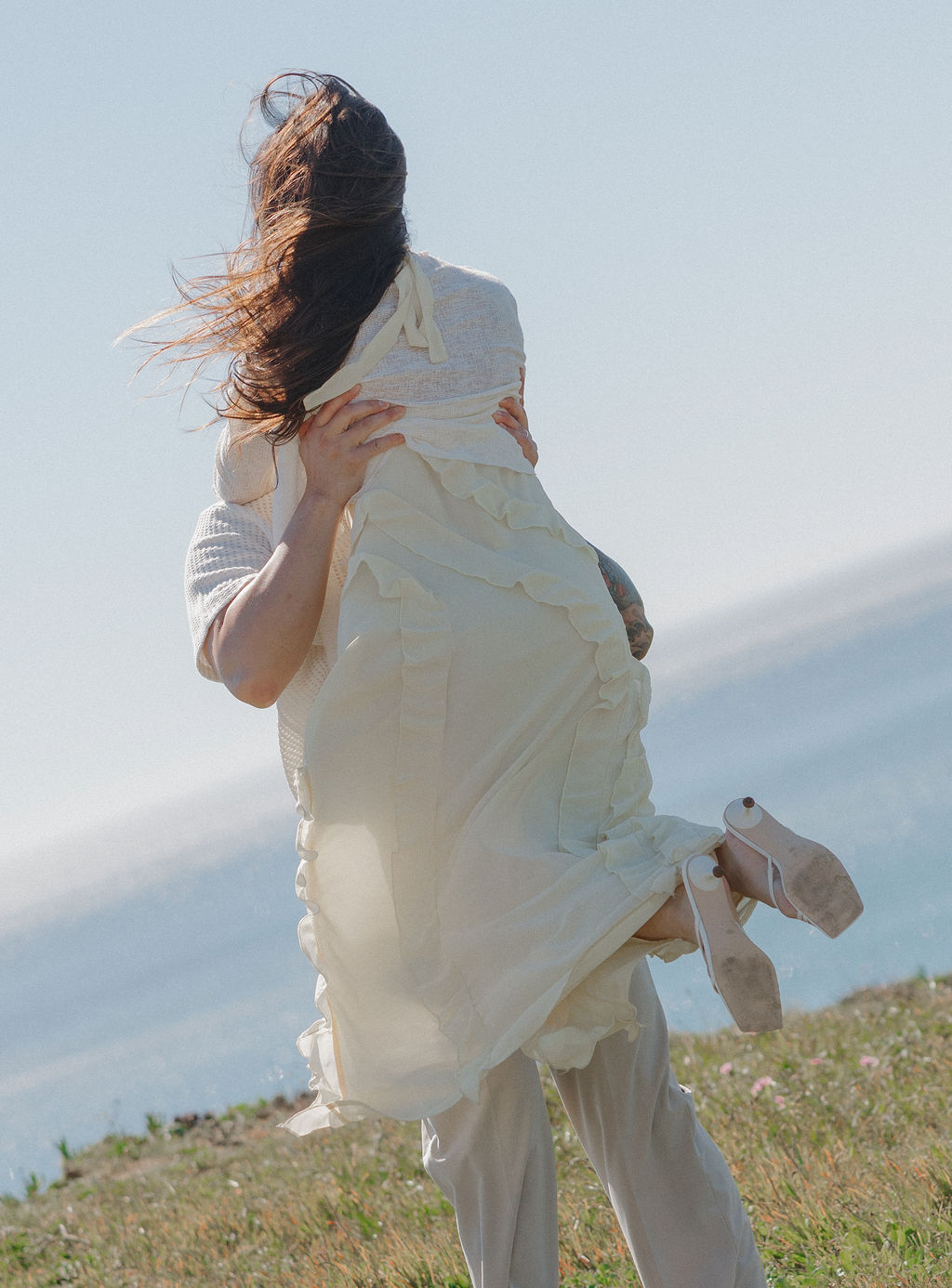 Blurry engagement photos on the coast