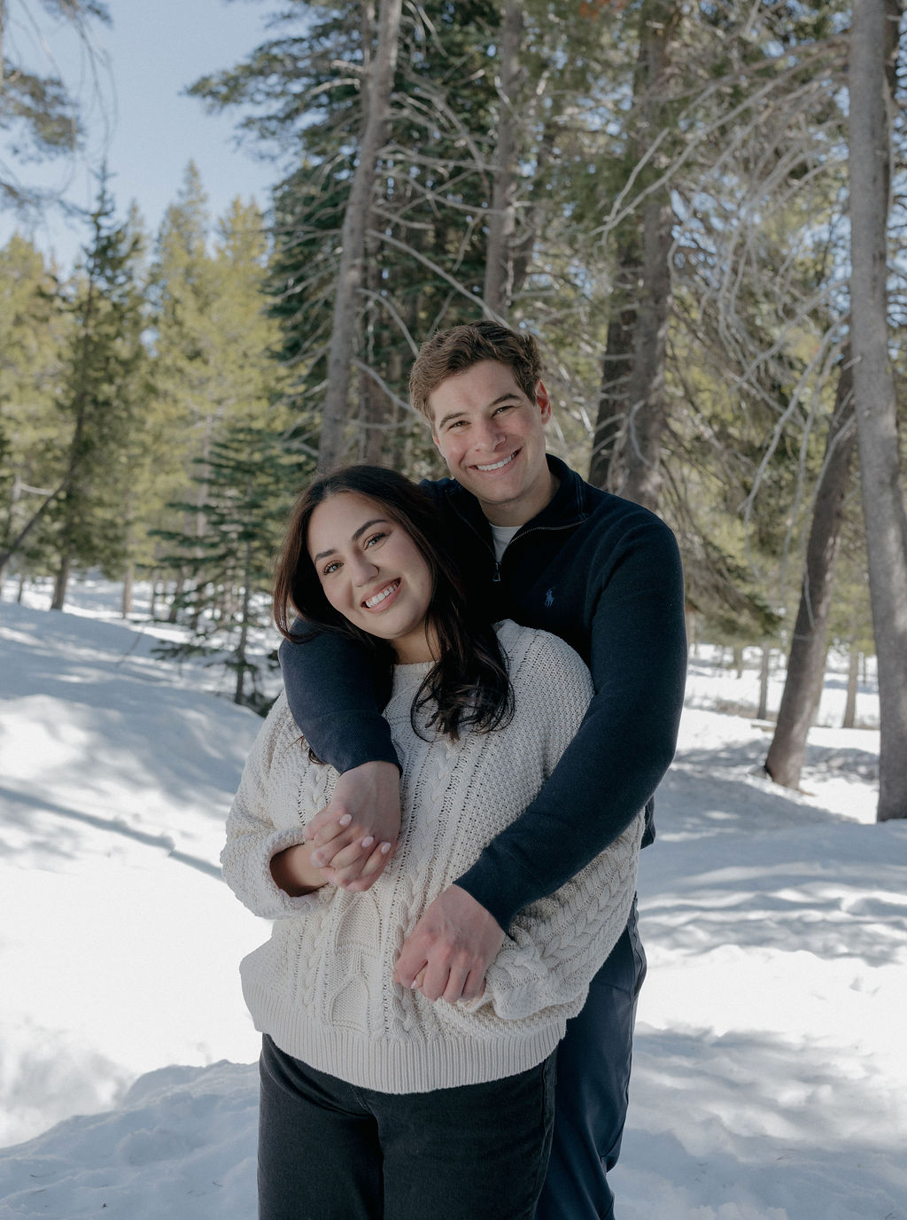 A couple posing for engagement photos