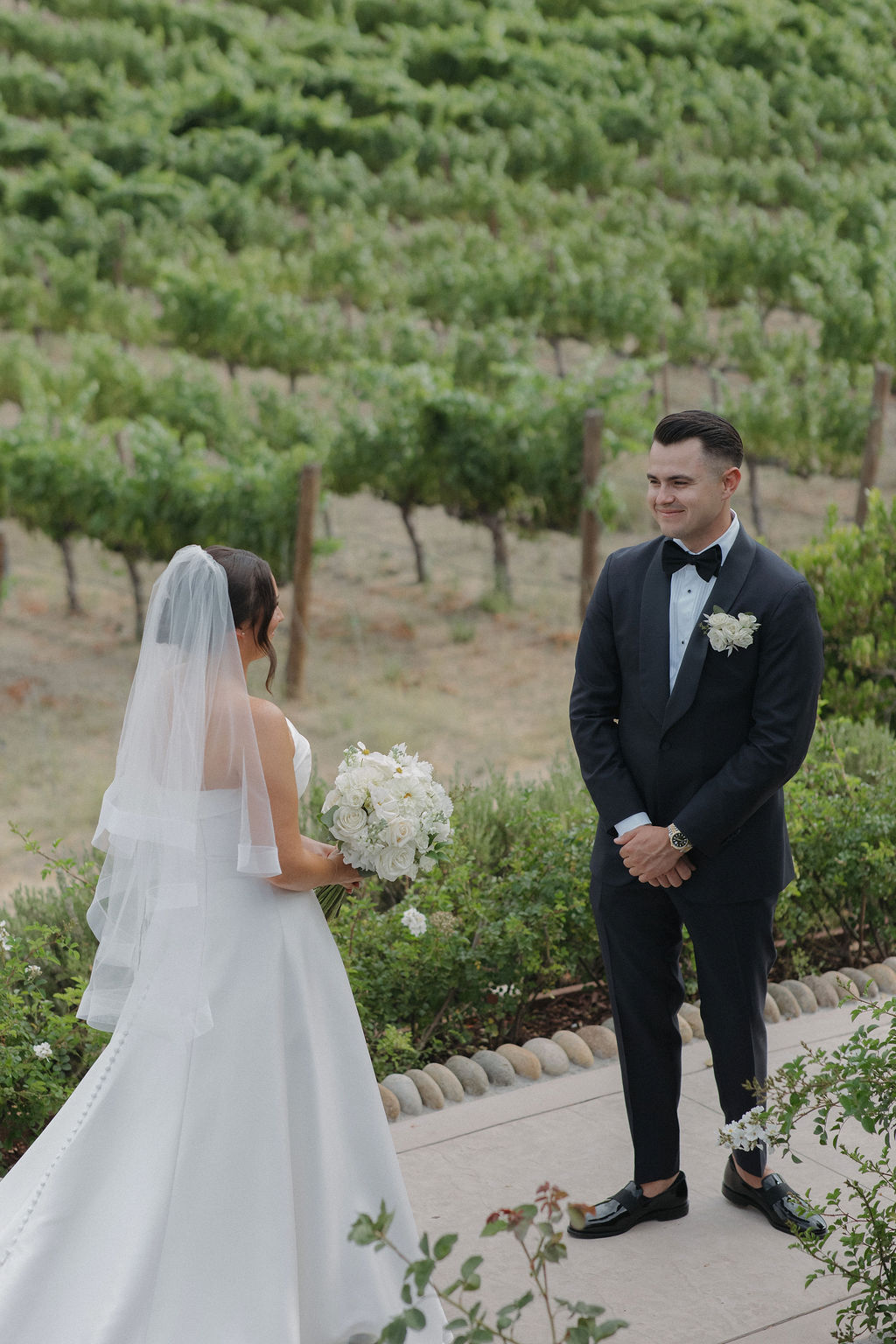 A bride and groom during their first look