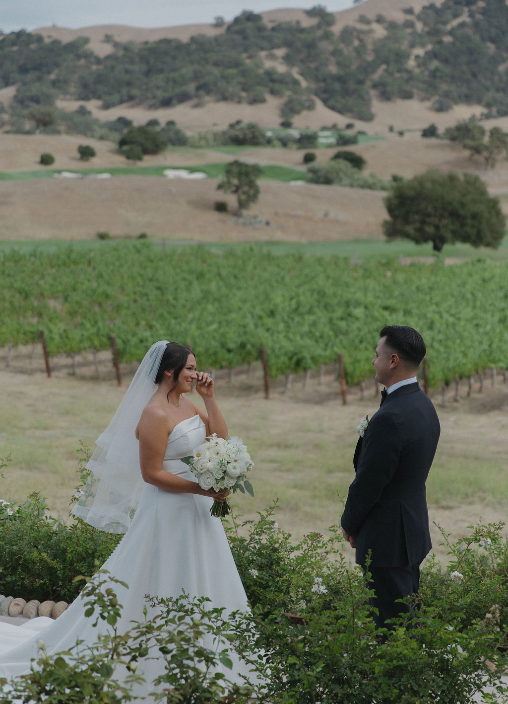 A bride and groom during their first look