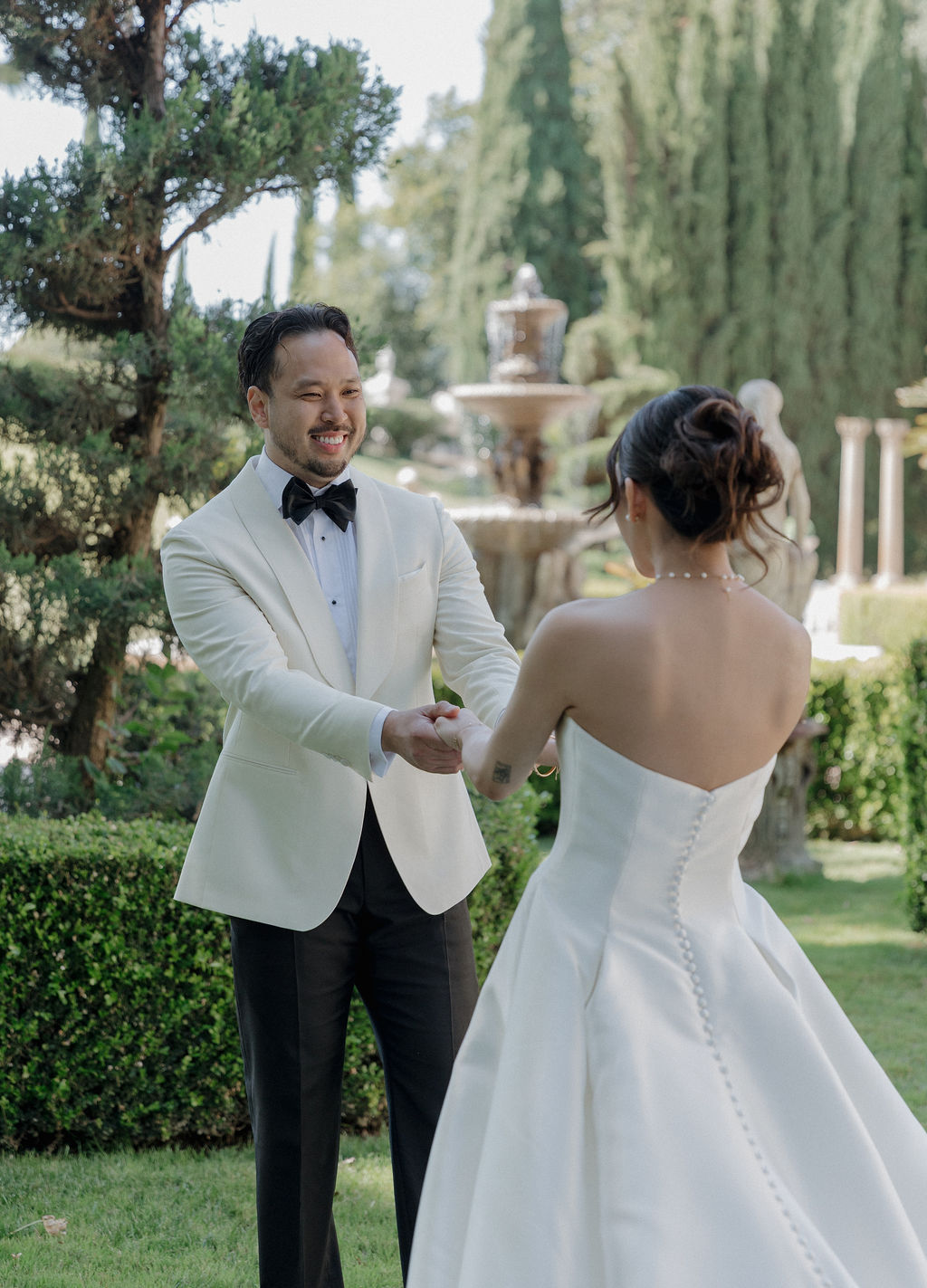 A bride and groom during their first look