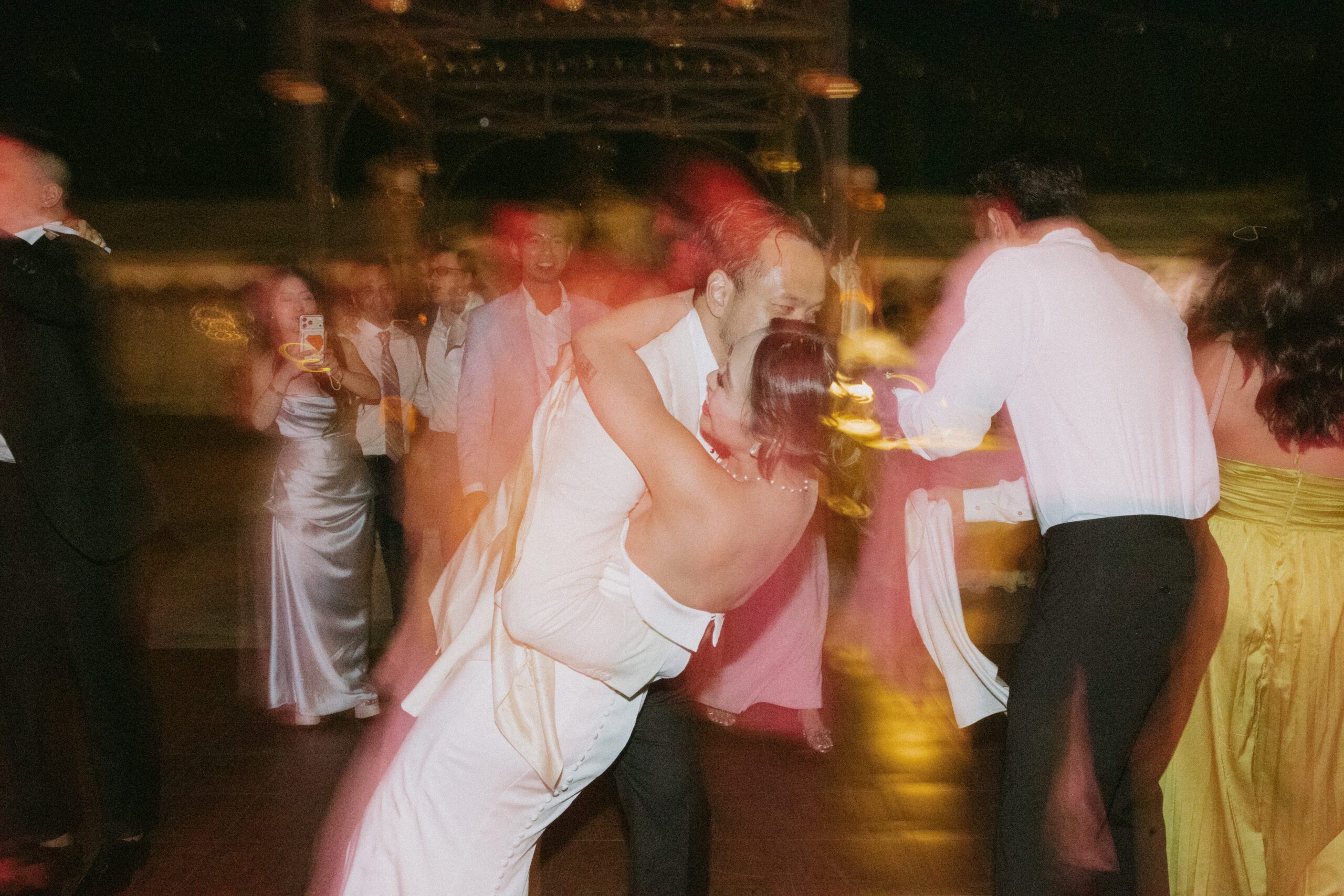 A bride and groom dancing during their wedding reception