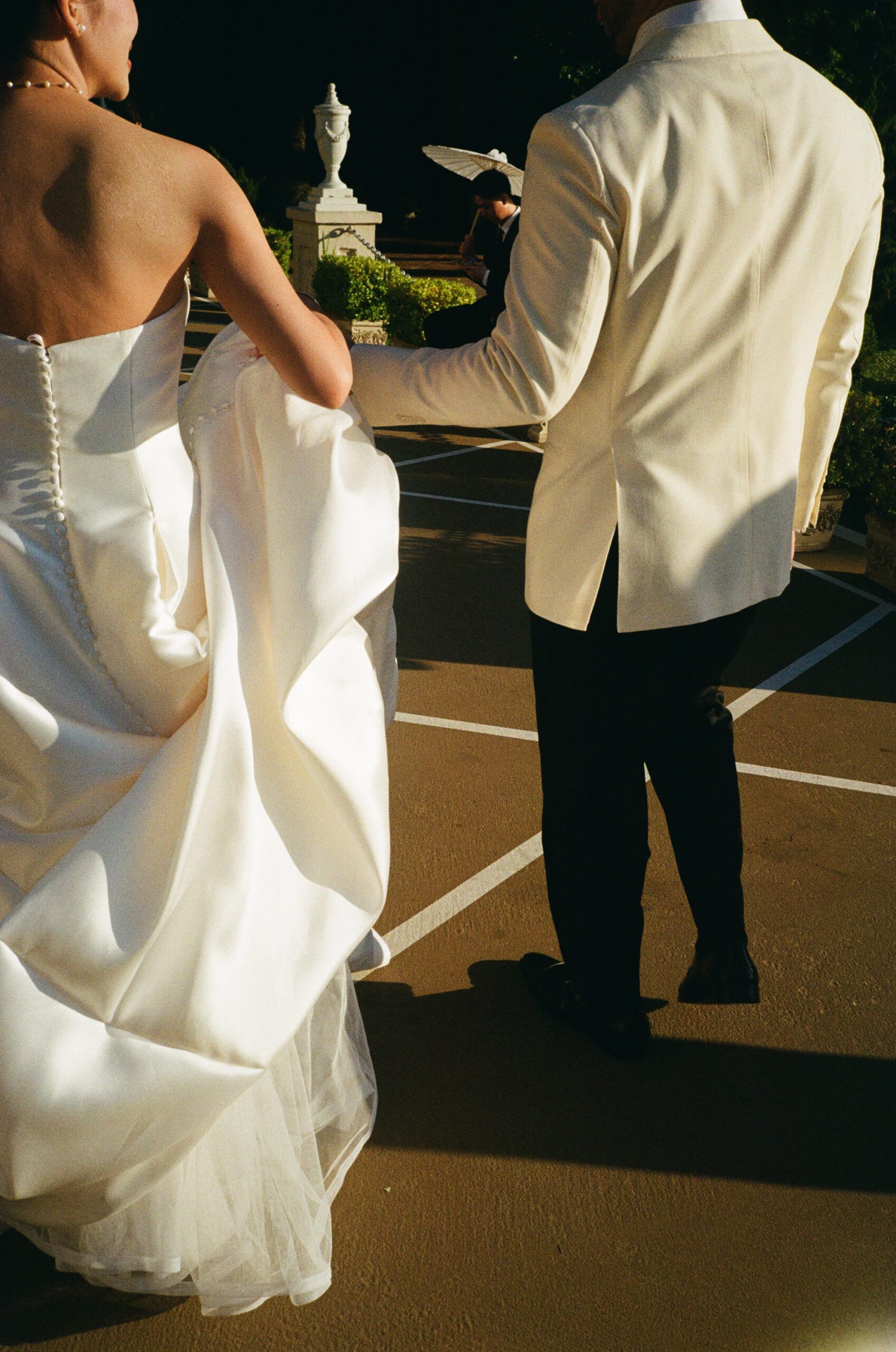 A bride and groom walking together