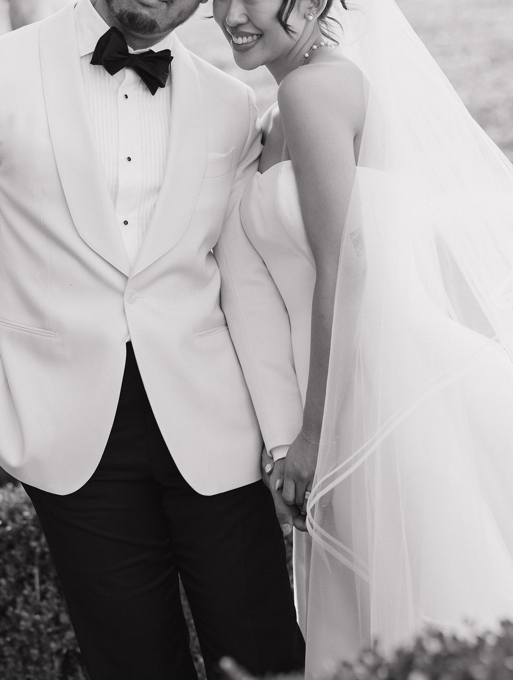 Black and white photos of a bride and groom