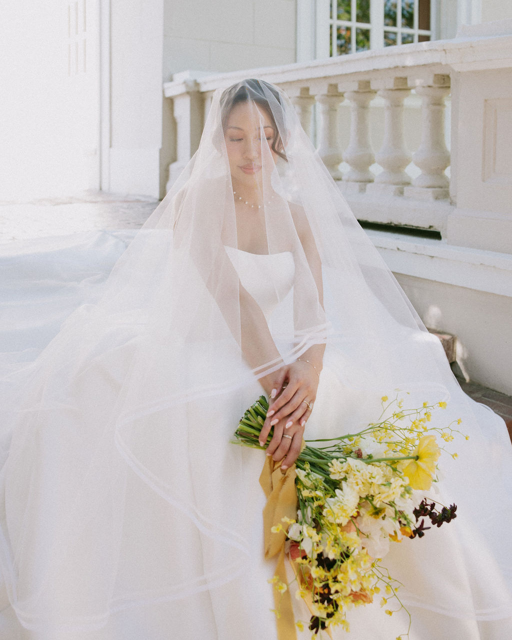 A bride holding a fall wedding bouquet for fall wedding ideas