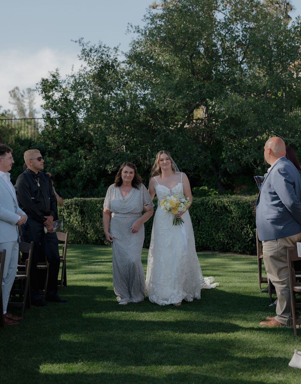 A bride walking down the aisle