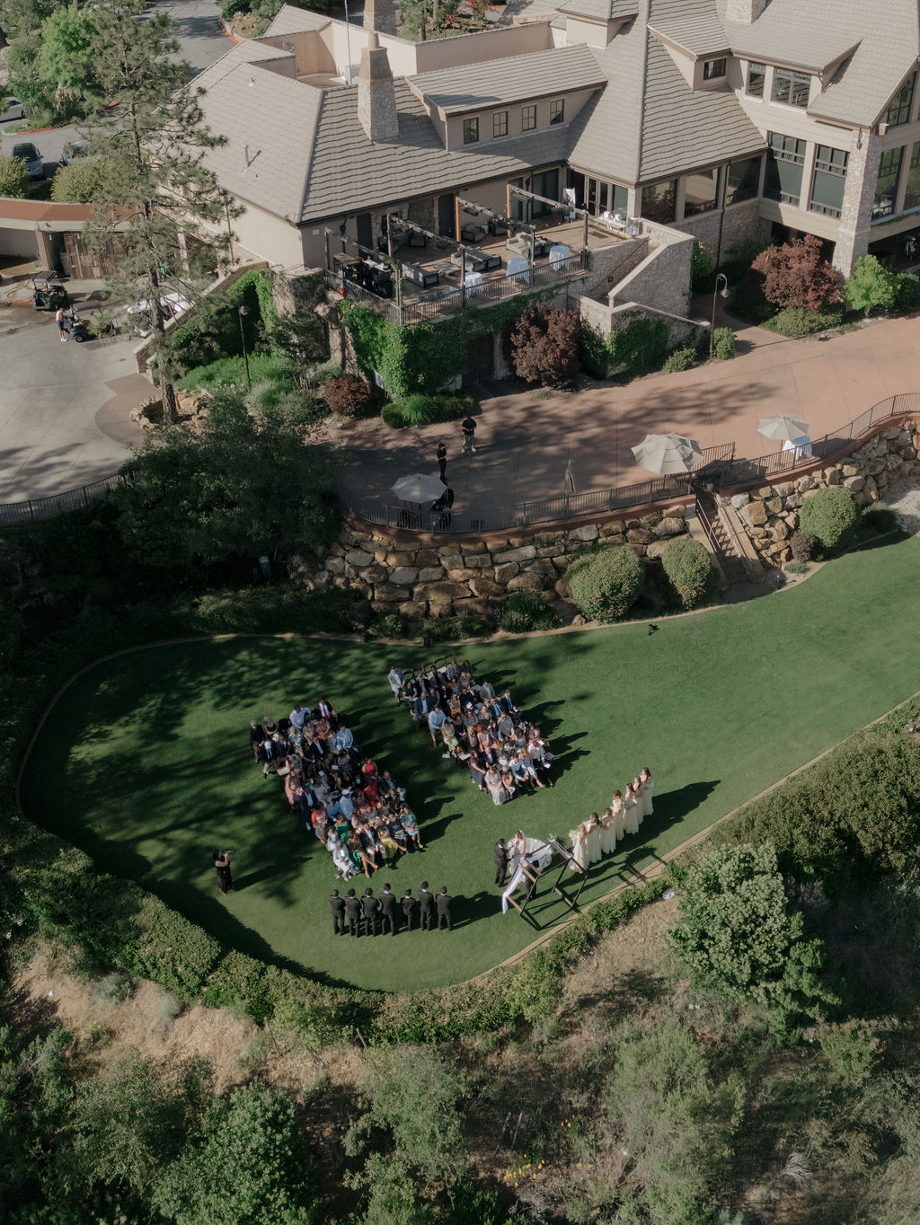 An outdoor wedding ceremony from a drone photo