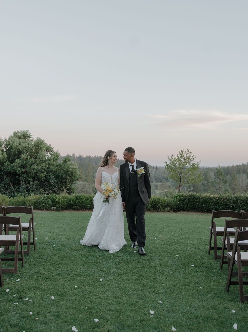 A bride and groom taking wedding photos at Winchester Vista