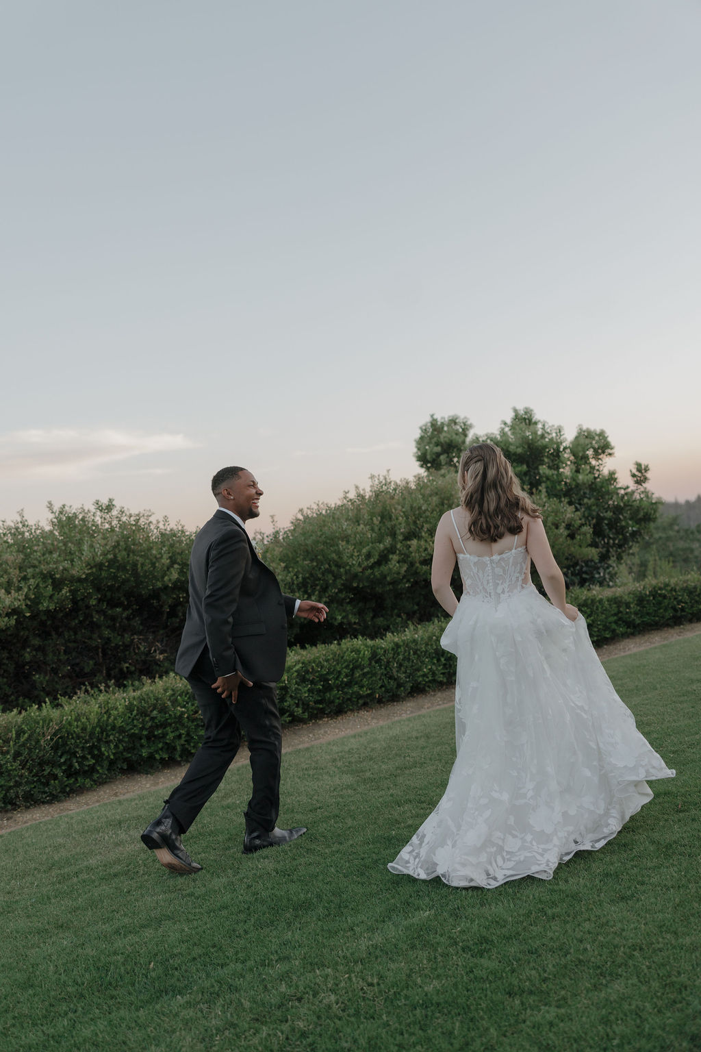 A bride and groom taking wedding photos at Winchester Vista
