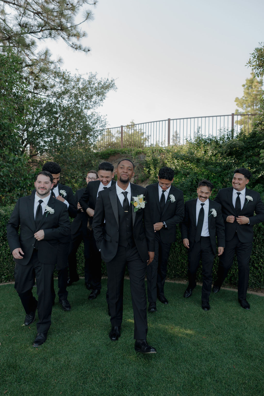 Groom party photos from an outdoor wedding
