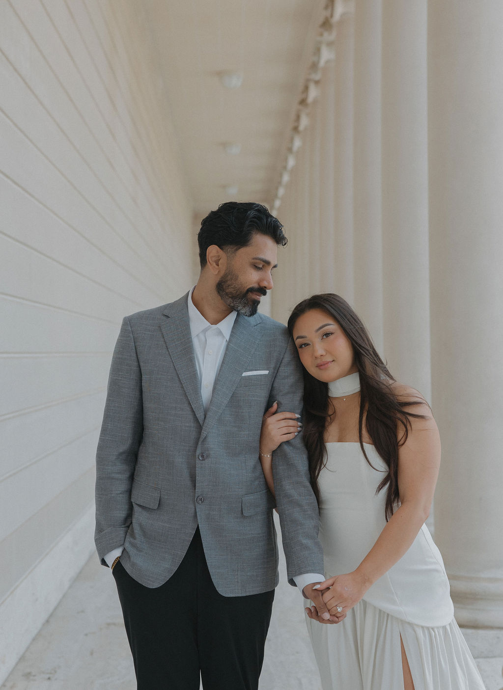 A couple posing for luxury engagement photos