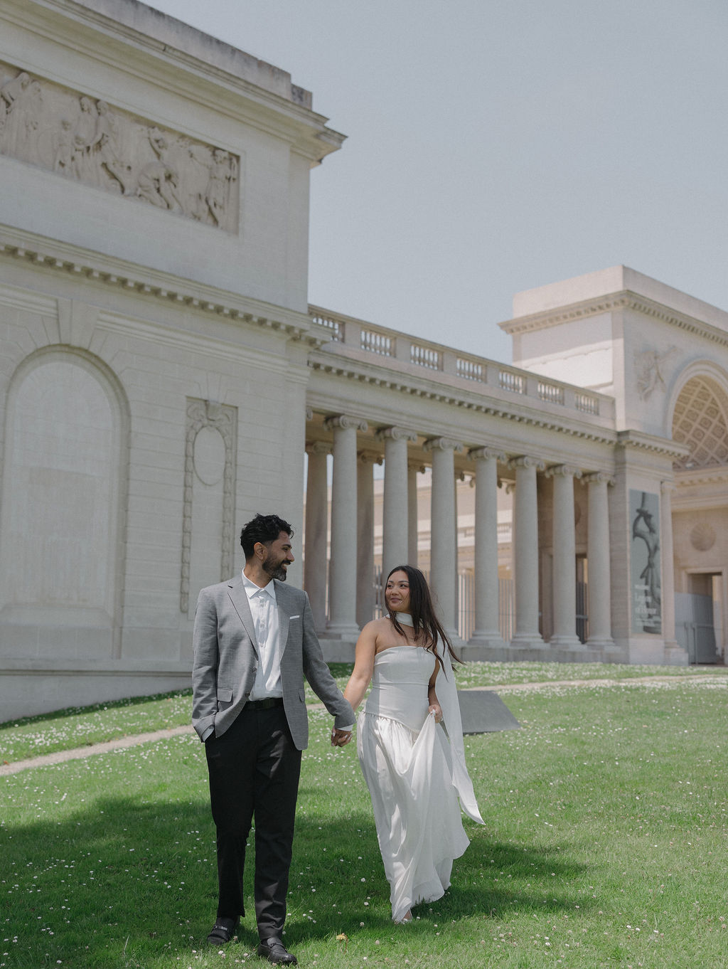A couple taking luxury engagement photos at Legion of Honor